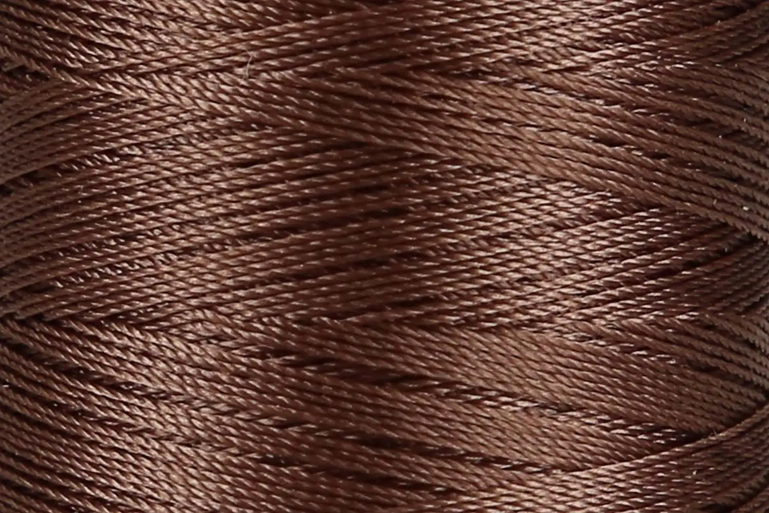 Elastická polyesterová nit 6077 Tmavě hnědá